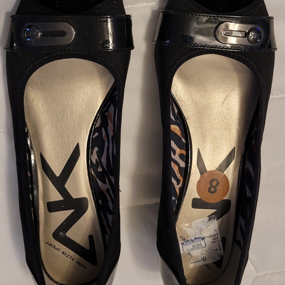 Size 8. Anne Klein Black slip on dress low wedge. NWOT.